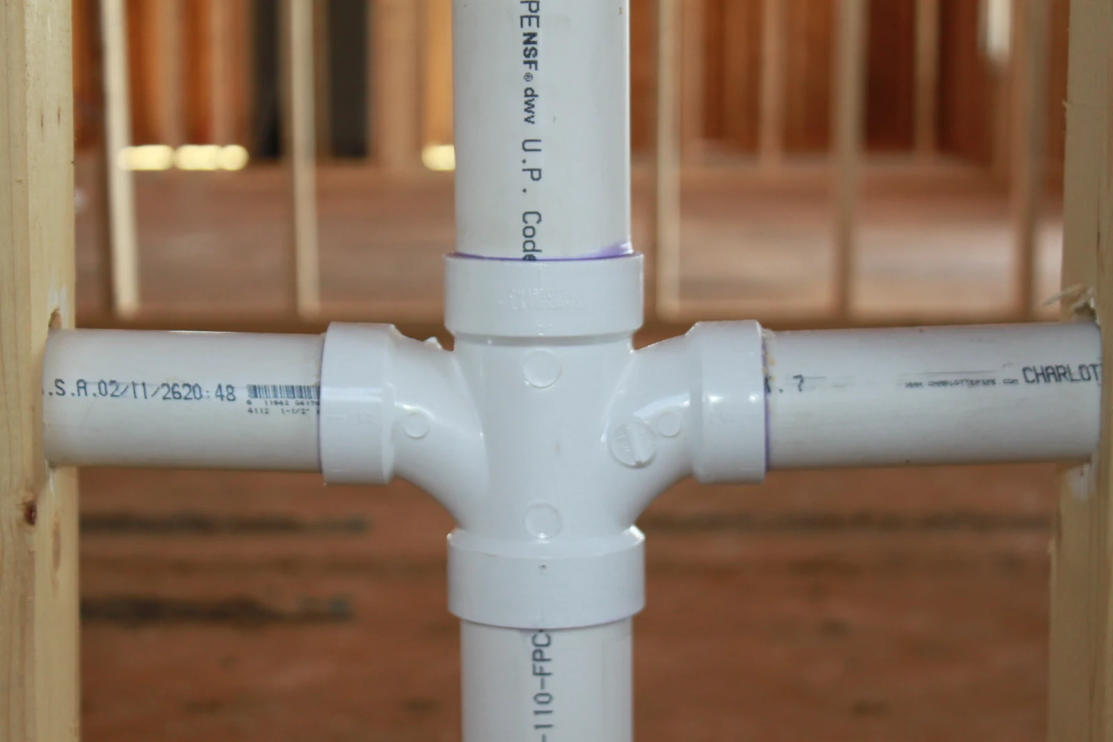 Drain fitting detail within the wall framing