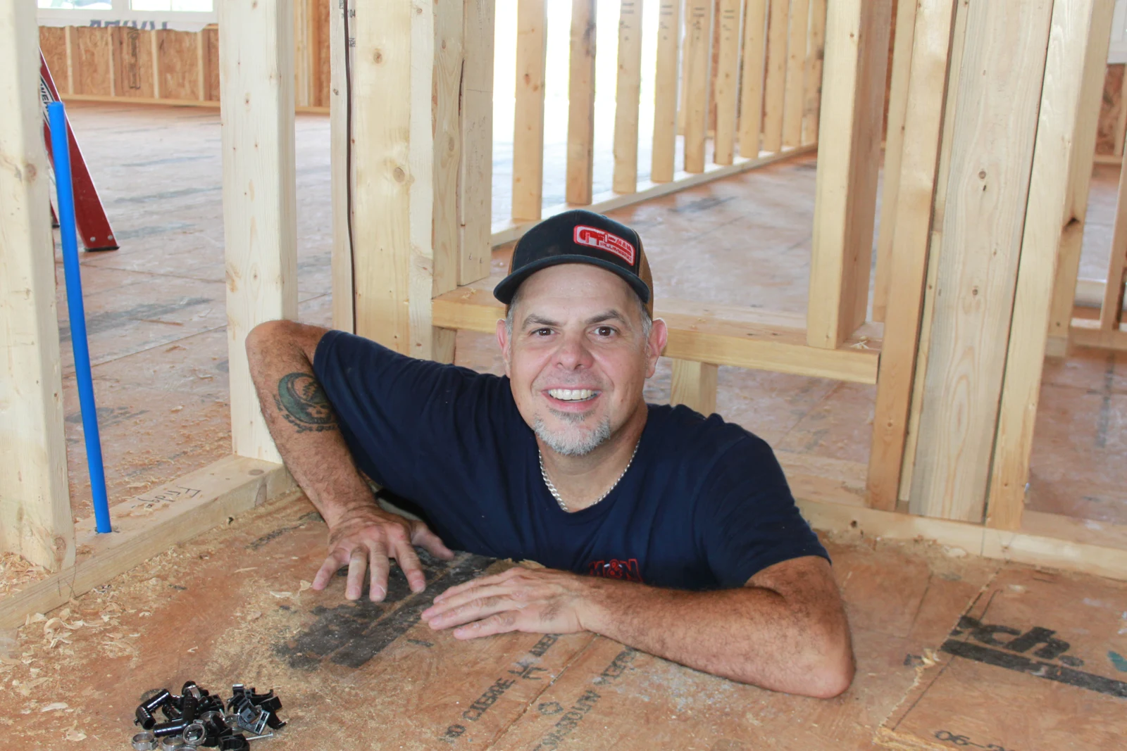 Mike working through a floor opening