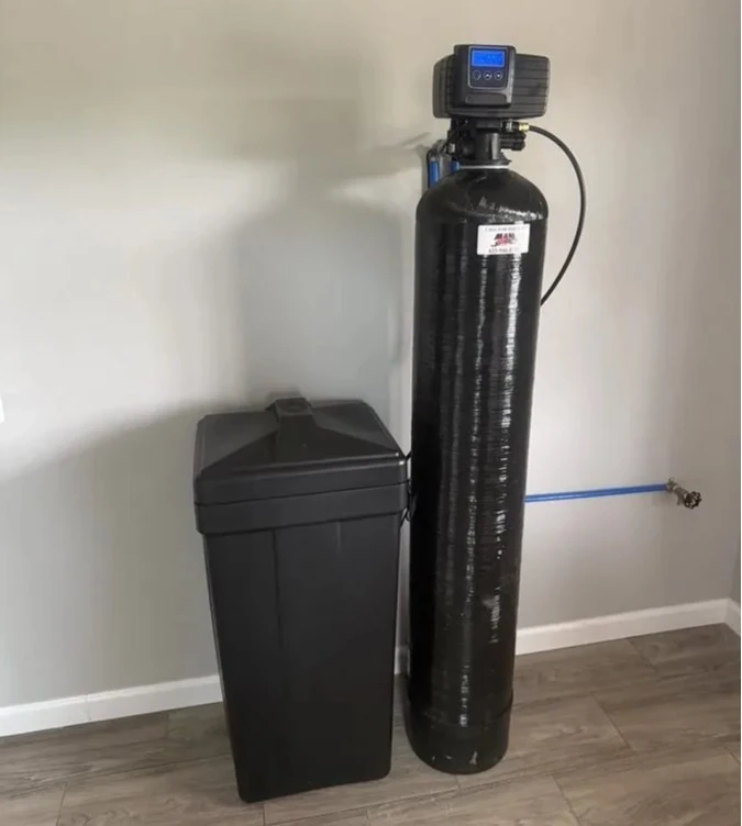 Water softener with a separate brine tank